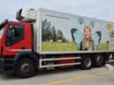 Truck advertising tarpaulin for REWE in Wiener Neudorf